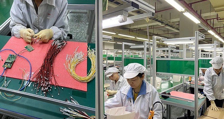 Factory workers in cleanroom attire assembling electronic components and wiring harnesses for pet devices, showing the complex production steps used by an Automatic Litter Box Manufacturer.