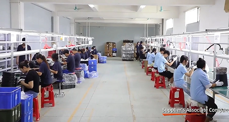 Workers assembling smart pet feeders on a well-lit production line, demonstrating the manufacturing capacity of CE FCC certified cat feeder manufacturers.