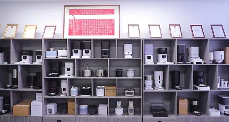 A comprehensive product showroom at an OEM&ODM Smart Pet Products Manufacturer displaying a wide variety of smart feeders and water fountains.